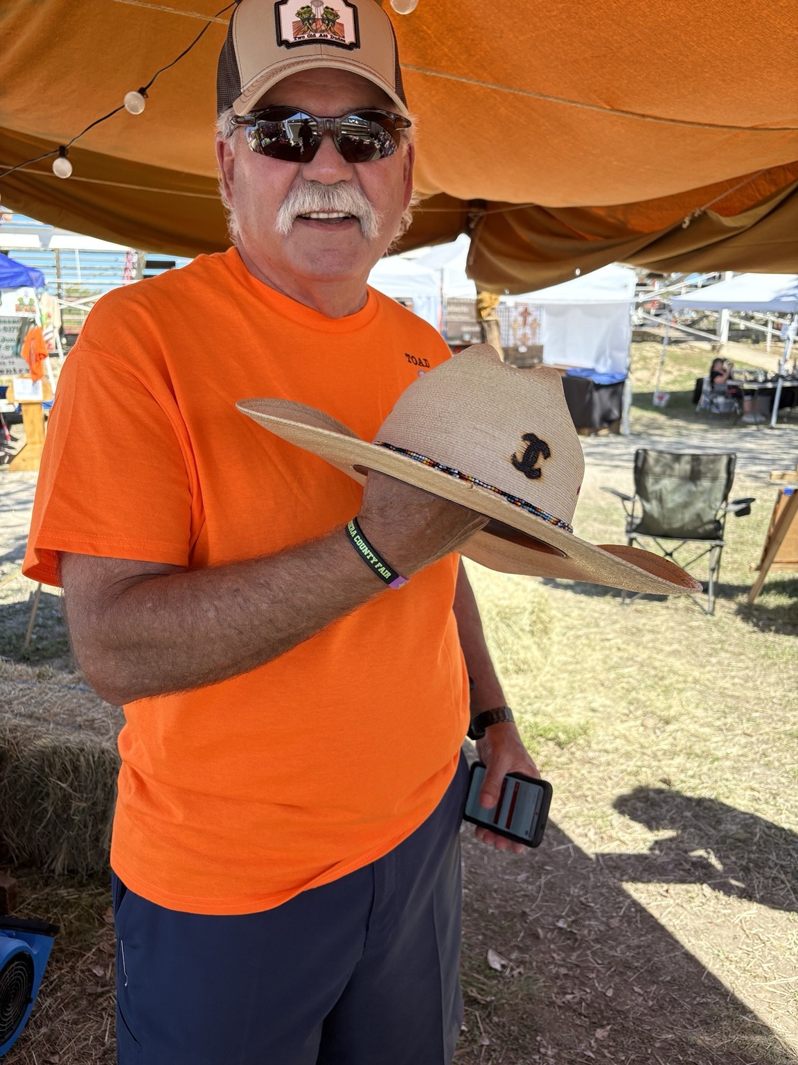 A guest with his personalized cowboy hat